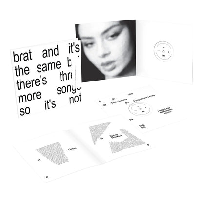 Charli XCX - Brat and it's the same but there's three more songs so it's not - White {vinyl LP}